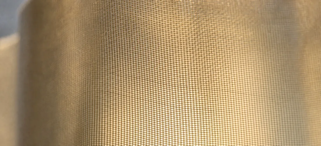 Macro of the pollen filter: narrow slots of the weave against the light