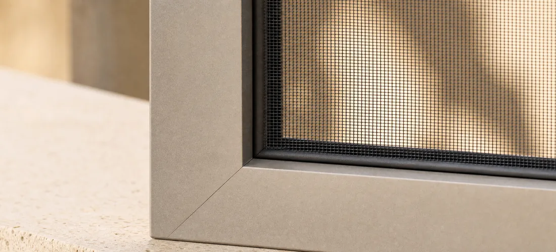 A frame corner close up: a tight joint and an even mesh edge