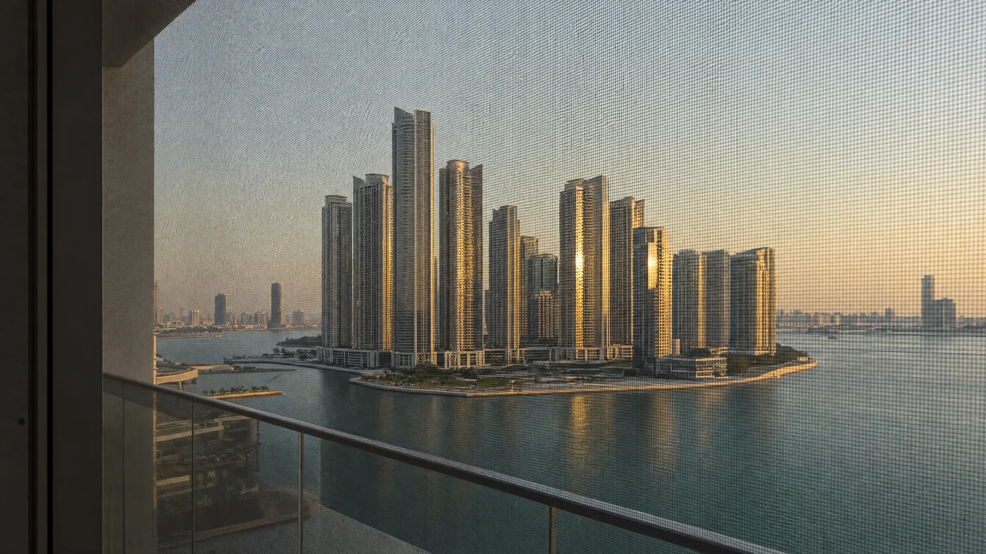 Typical Al Reem Island architecture with an insect screen on the window in front