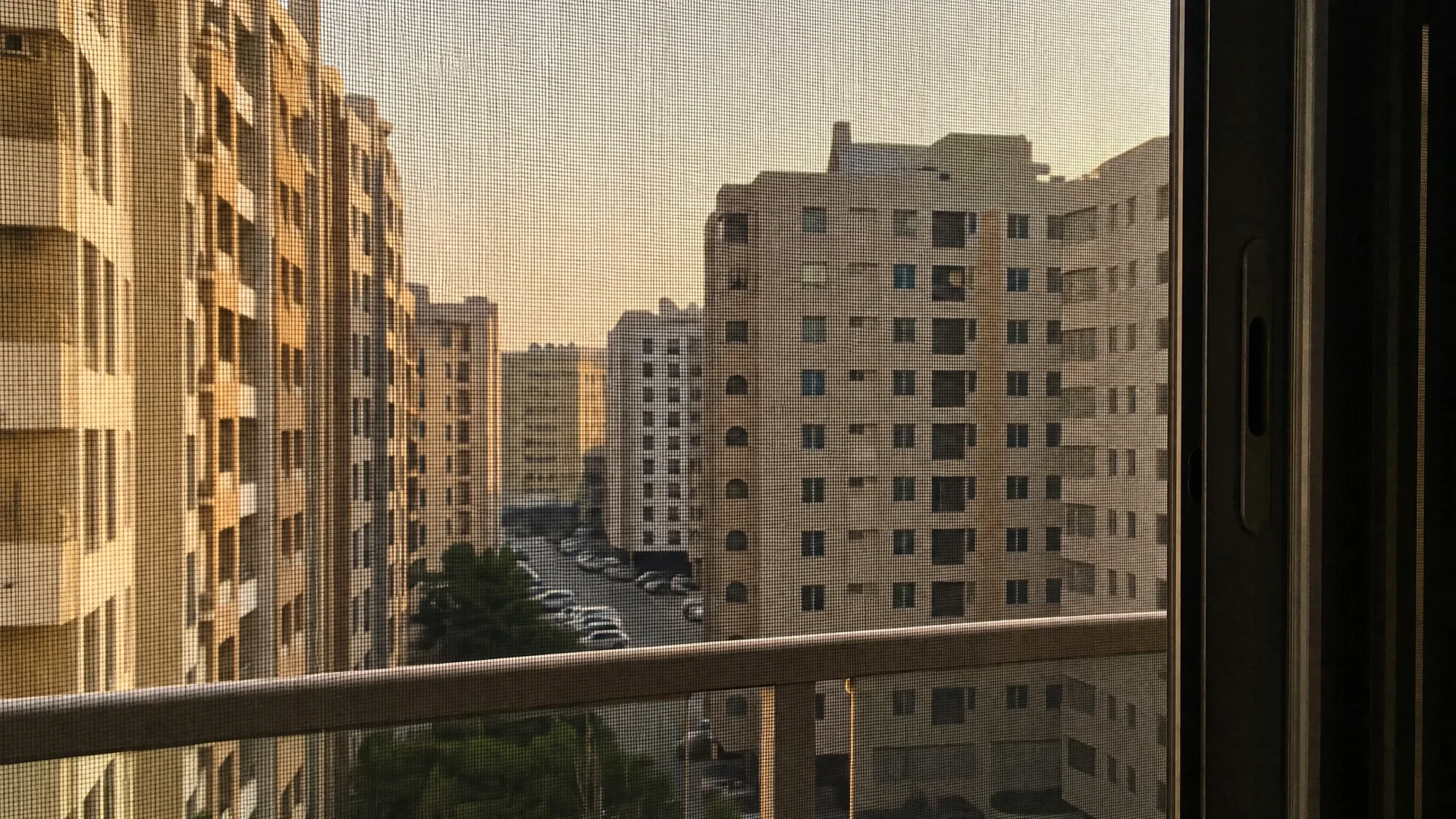 Typical Ajman architecture with an insect screen on the window in front