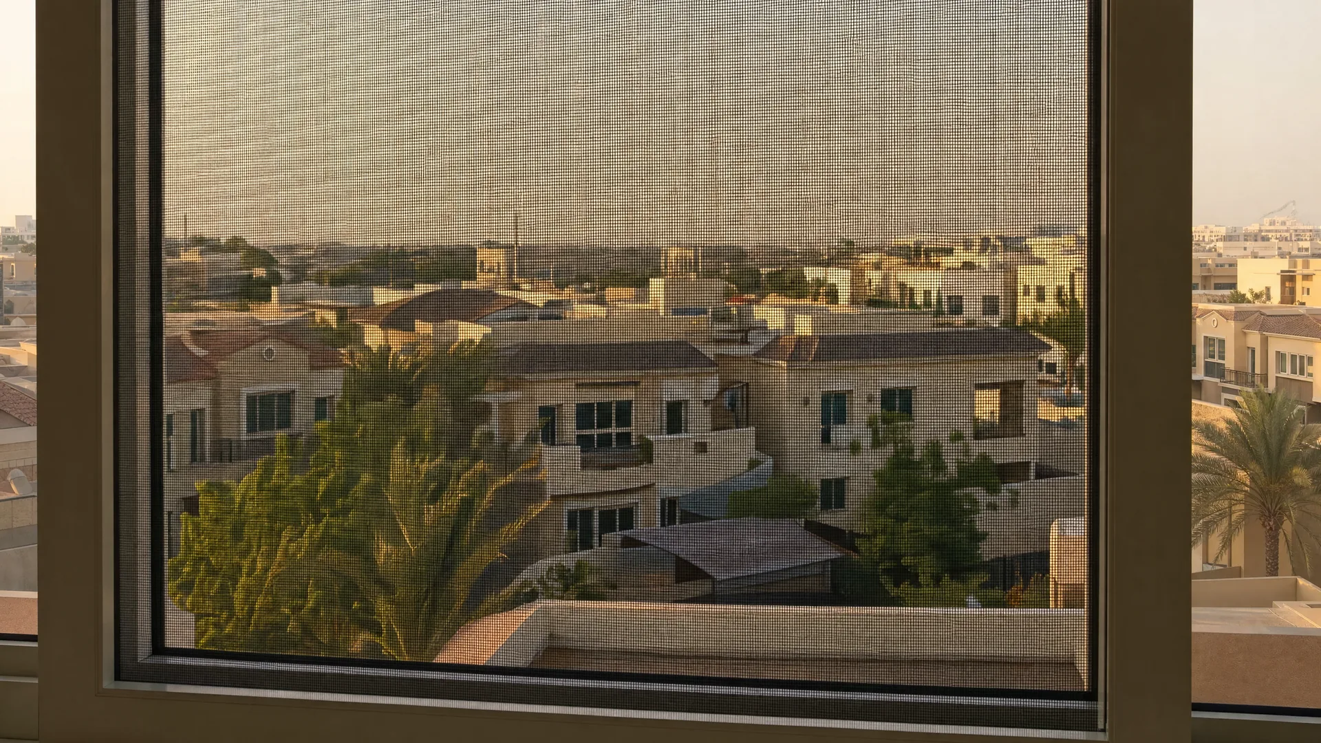 Typical JVC architecture with an insect screen on the window in front